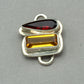 Tabra Garnet and Citrine Charm